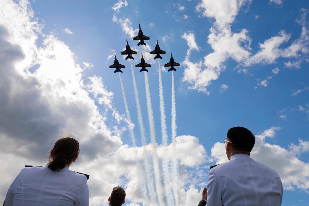 The Blue Angels, known officially as the U.S. Navy Flight Demonstration Squadron, perform a flyover during the U.S. Naval Academy's graduation and commissioning ceremony at the U.S. Naval Academy in Annapolis