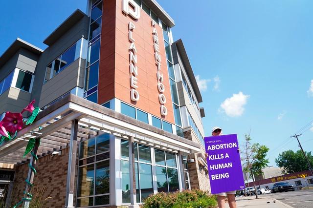Pro-Life protester demonstrates in front of a Planned Parenthood on July 12, 2022, in Saint Paul, Minn. 