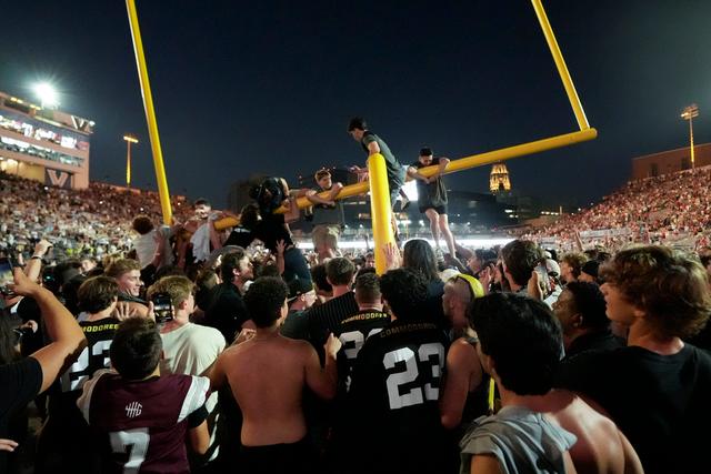 Vanderbilt fans tear down the goal post the after team's 40-35 win over No. 1 Alabama in an NCAA college football game Saturday, Oct. 5, 2024, in Nashville, Tenn